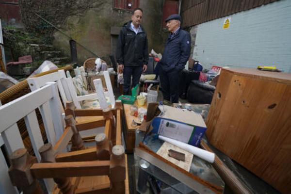 Taoiseach Leo Varadkar observes the damage to a local business on Main Street in Midleton, Picture: Brian Lawless/PA Wire Taoiseach Leo Varadkar observes the damage to a local business on Main Street in Midleton, Picture: Brian Lawless/PA Wire