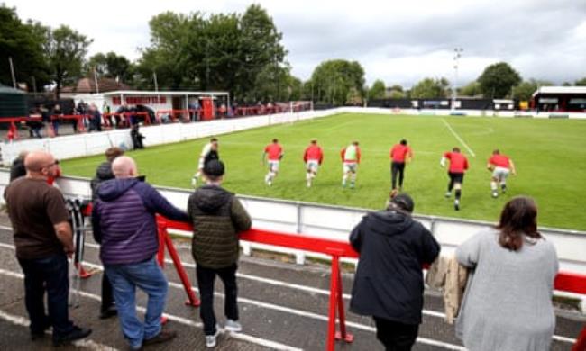 Fans watch Ashton United warm up