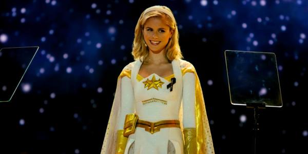 Erin Moriarty as Starlight smilling on stage in The Boys