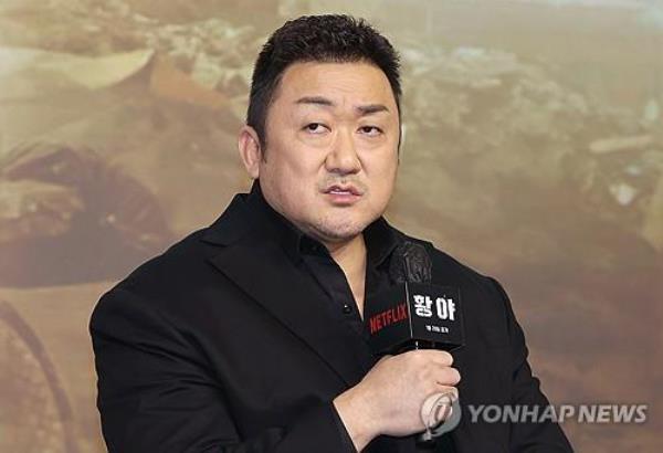 Ma Dong-seok, also known as Don Lee, speaks during a press event for 