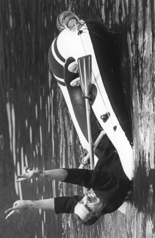 A person in a Richard Nixon mask leans back in a raft during the fourth annual Petaluma River Raft Regatta, on Sept. 18, 1982. The regatta was held from 1979 to 1985 on the Petaluma River, a precursor to the races held during the Petaluma River Festival that started in 1986. (The Press Democrat)