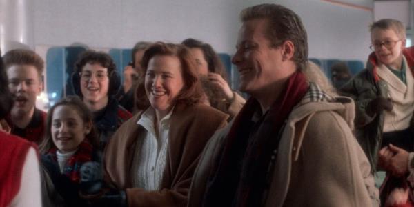 The McCallister Family led by Catherine O'Hara and John Heard as Kevin's parents, Kate and Peter, at the Airport in Home Alone
