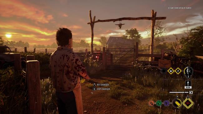 Leatherface looks at a gate blocking an exit off the farm while the sun sets in the background.