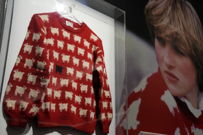 FILE - The historic Princess Diana black sheep jumper is on display at the auction house Sotheby's in London, Monday, July 17, 2023. (AP Photo/Frank Augstein, File)