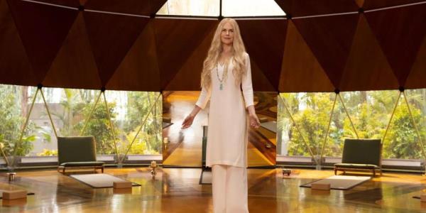 Nicole Kidman standing on a stage in Nine Perfect Strangers