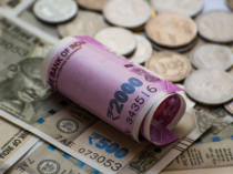 Rupee rises on inflows, oil companies' dollar buys cap gain (