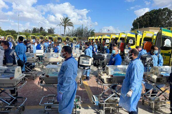 Egyptian medics stand by with incubators to receive premature Palestinian babies evacuated from Gaza on the Egyptian side of the Rafah border crossing with the Gaza Strip, on November 20, 2023. Picture: AFP via Getty Images
