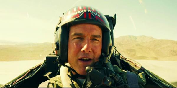 Tom Cruise speaking while in a fighter jet cockpit in Top Gun: Maverick.