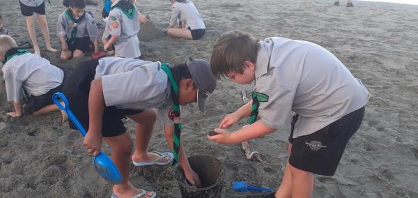 Mark (left) during one of the beach clean ups he took part in.