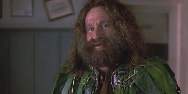 Alan (Robin Williams) with a scraggly beard and leaf cloak in Jumanji