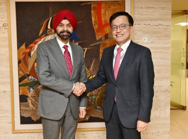 South Korean Finance Minister Choi Sang-mok (R) shakes hands with World Bank Group President Ajay Banga ahead of their meeting in Washington on April 18, 2024, in this photo provided by South Korea's finance ministry. (PHOTO NOT FOR SALE) (Yonhap)