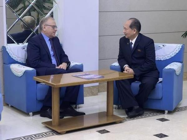 North Korea's Public Health Minister Jong Mu-rim (R) holds talks with Russian Ambassador to North Korea Alexander Matsegora, in this photo posted on a Facebook site of the Russian Embassy in Pyongyang. (PHOTO NOT FOR SALE) (Yonhap)