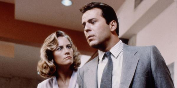 Cybill Shepherd glowering at a surprised Bruce Willis on Moonlighting